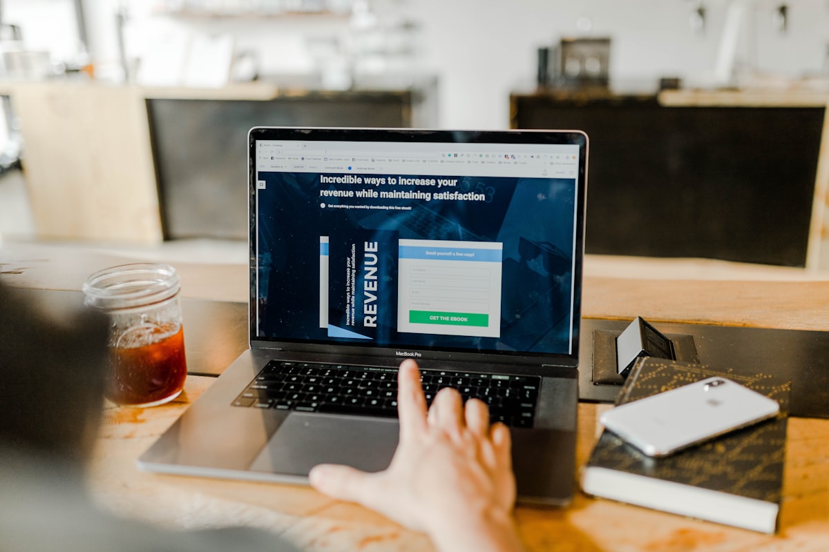 Business owner calculating monthly revenue and bank statements